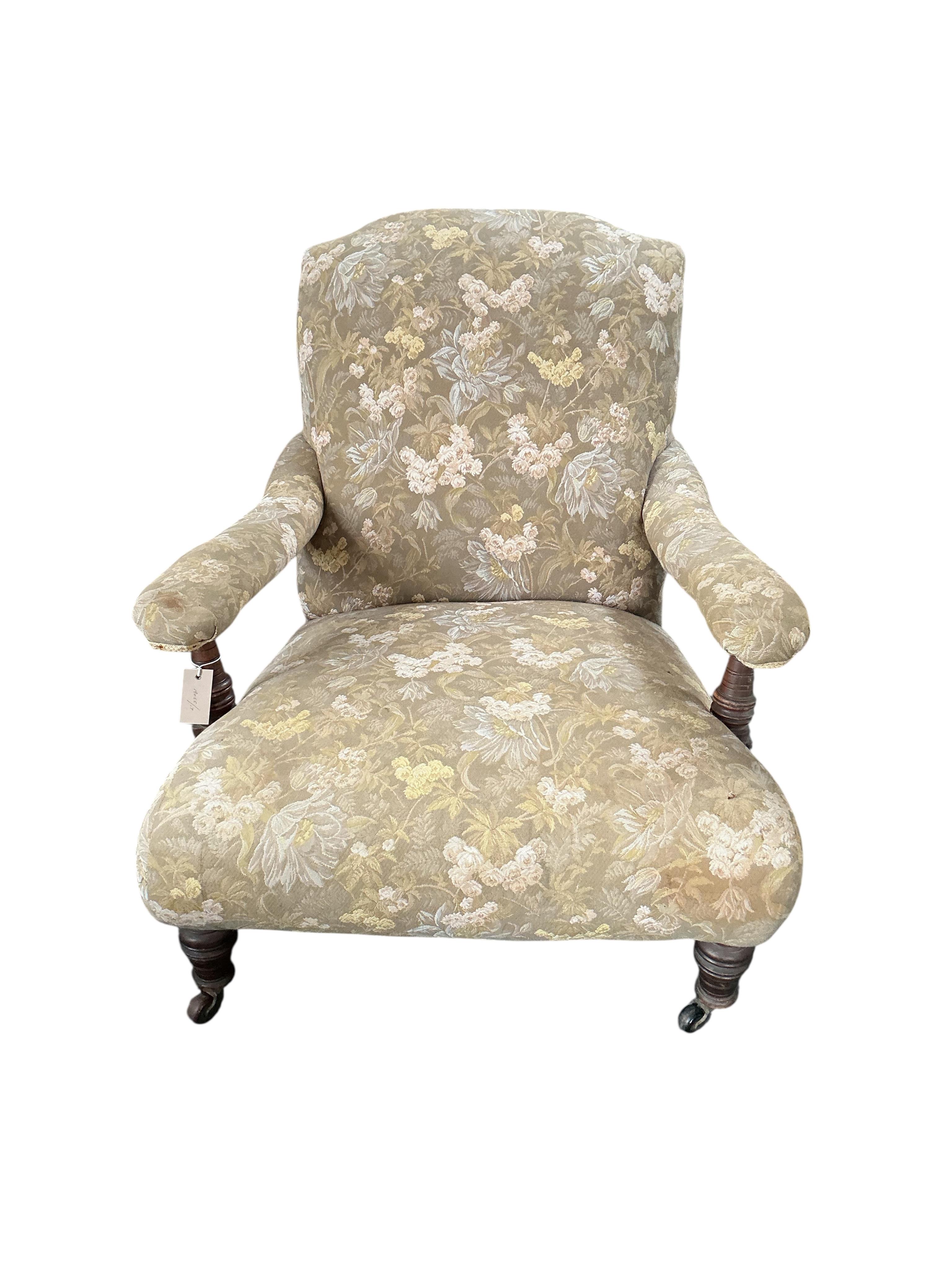 A Victorian Howard style upholstered open armchair, width 74cm, depth 100cm, height 100cm